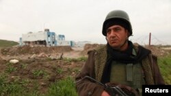 កង​កម្លាំង​របស់​ក្រុម​ Kurd ដើរ​ល្បាត​នៅ​ក្នុង​តំបន់​ Zumar ក្នុង​ខេត្ត Nineveh នៅ​ក្បែរ​ភ្នំ Sinjar ​កាល​ពី​ថ្ងៃទី​១៨ ​ខែធ្នូ ​ឆ្នាំ២០១៤។