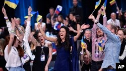 Ukraine's Jamala celebrates after learning that she advanced to the final during the second Eurovision Song Contest semifinal in Stockholm, Sweden.