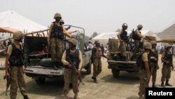 Models in Utrecht, Netherlands, wear floral arrangements as they interact with travelers to promote Keukenhof, the largest flower show in the world.