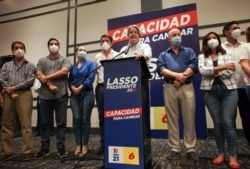 Ecuador's presidential candidate Guillermo Lasso attends a news conference in Guayaquil, Feb. 8, 2021.