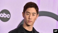 FILE - K-pop musician Mark Tuan arrives at the American Music Awards in Los Angeles on Nov. 20, 2022. (Photo by Jordan Strauss/Invision/AP, File)