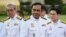 Thailand's Prime Minister Prayuth Chan-ocha, center, arrives for a photo opportunity with members of the new Thai cabinet at Government House in Bangkok, July 16, 2019. 