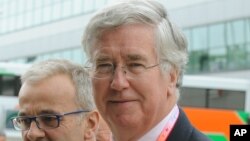 FILE - British Secretary of State for Defence Michael Fallon.