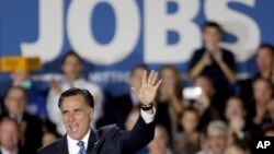 Capres partai Republik Mitt Romney menyoroti pengangguran yang meningkat dalam kampanye di Wisconsin Products Pavilion at State Fair Park, Wisconsin (2/11).