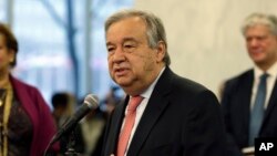 United Nations Secretary-General Antonio Guterres talks with members of the U.N. staff at U.N. headquarters, Jan. 3, 2017. 