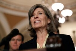 Sen. Joni Ernst speaks to the media with members of Senate Republican leadership after their weekly policy luncheon on Capitol Hill in Washington, July 30, 2019.