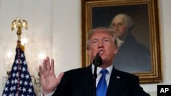President Donald Trump makes a statement on Iran policy in the Diplomatic Reception Room of the White House, in Washington, Oct. 13, 2017.