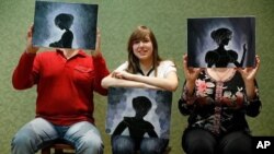 Katya Nosova is 16 and wants to be an artist. Her parents Sasha (left) and Lesya (right) hope to send her to a private art institute in Kyiv. Katya is growing up in Borodyanka, Ukraine, where many Chernobyl evacuees were resettled.