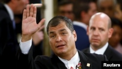 FILE - Rafael Correa, then Ecuador's president, waves as he arrives for an inaugural ceremony in Buenos Aires, Argentina, Dec.10, 2015.