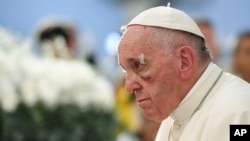 A bruised Pope Francis visits the Sanctuary of St. Peter Claver, in Cartagena, Colombia, Sept. 10, 2017. 