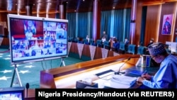 Le président nigérian Muhammadu Buhari préside une réunion du gouvernement à Abuja, au Nigeria, le 13 mai 2020. (Photo: Nigeria Presidency/Handout via REUTERS)
