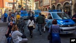 Policijski kombiji u centru Minstera u Nemačkoj, 7. aprila 2018.
