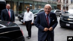 FILE - Former New York mayor Rudy Giuliani arrives at Trump Tower.