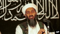 FILE - In this 1998 file photo made available on March 19, 2004, Osama bin Laden is seen at a news conference in Afghanistan. 