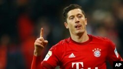 Robert Lewandowski célèbre son but contre SV Werder Bremen, Allemagne, le 12 mars 2016 