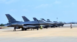 FILE - Six U.S. F-16 Fighting Falcons from Aviano Air Base, Italy, arrive at Incirlik Air Base, Turkey, to take part in anti-Islamic State missions, Aug. 9, 2015.