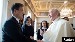 Pope Francis meets South Korean President Moon Jae-in and his wife Kim Jung-Sook at the Vatican, Oct. 29, 2021