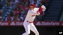 Los Angeles Angels' designated hitter Shohei Ohtani (17) waits for a pitch during the sixth inning of a baseball game against the Texas Rangers in Anaheim, Calif., Oct. 2, 2022. (AP Photo/Ashley Landis, File)