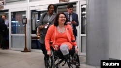 U.S. Senator Tammy Duckworth (D-IL) arrives for the fourth day of the Senate impeachment trial of U.S. President Donald Trump at the U.S. Capitol in Washington, U.S., January 24, 2020. REUTERS/Erin Scott