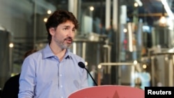 FILE - Canada's Prime Minister Justin Trudeau speaks to the media in Kanata, Ontario, Canada, June 26, 2020.