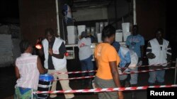 A front loader removes debris in a damaged site after airstrikes on the rebel held Tariq al-Bab neighbourhood of Aleppo, Sept. 24, 2016.