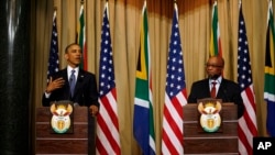 FILE - U.S. President Barack Obama and South African President Jacob Zuma address a press conference following their meeting at Union Building in Pretoria, South Africa, June 29, 2013.