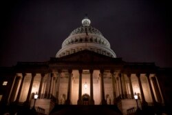 The Dome of the U.S. Capitol is visible in the early morning hours of Dec. 9, 2019.