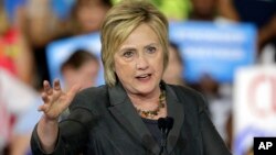 Democratic presidential candidate Hillary Clinton gestures as she speaks during a rally in Raleigh, N.C., June 22,
