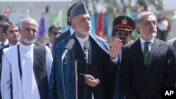 Afghan President Hamid Karzai speaks during the Independence Day ceremony in Kabul, Afghanistan, Aug. 19, 2014. 