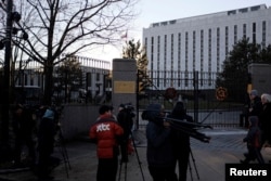 Television crews assemble outside the Russian Embassy on Wisconsin Avenue in Washington, U.S., Dec. 29, 2016.