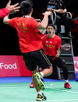 Ekspresi Jonatan Christie setelah memenangkan pertandingan tunggal putra melawan Li Shi Feng dari China dalam laga Piala Thomas. (Foto: Claus Fisker/Ritzau Scanpix via REUTERS)