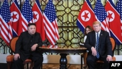 FILE - U.S. President Donald Trump and North Korea's leader Kim Jong Un meet during the second U.S.-North Korea summit at the Sofitel Legend Metropole hotel in Hanoi, Feb. 28, 2019.