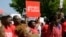 Protesters march in support of the girls kidnapped by members of Boko Haram in front of the Nigerian Embassy in Washington on May 6, 2014. 