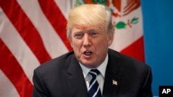 Expatriate returning from Egypt, Syria, and Lebanon arrive to be re-tested at a Kuwaiti Health Ministry containment and screening zone for COVID-19 disease in Kuwait City.