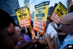 Protesters clash in Public Square on July 21, 2016, in Cleveland, during the final day of the Republican convention.