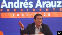 The top candidate in Sunday’s ballot Andres Arauz, presidential candidate for the United for Hope Alliance or UNES, speaks at a press conference in Quito, Ecuador, Feb. 9, 2021.