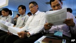 Teachers and students participate in a campaign by the National Election Committee, NEC, in Phnom Penh, Cambodia, Wednesday, May 9, 2018. NEC on Wednesday held its campaign with the teachers and students on the disseminate awareness of the law on the orga