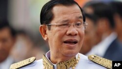 Cambodia's Prime Minister Hun Sen waits to attend Independence Day celebrations in Phnom Penh, Cambodia, Nov. 9, 2017.