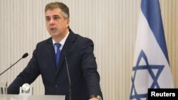 الی کوهن - آرشیو