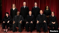 FILE - U.S. Supreme Court justices pose for their group portrait at the Supreme Court in Washington, Oct. 7, 2022.
