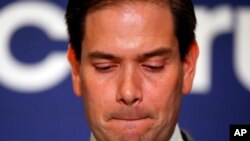 FILE - Sen. Marco Rubio, R-Florida, speaks during a Republican primary night celebration rally at Florida International University in Miami, Florida, March 15, 2016. 