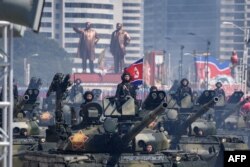 FILE - Korean People's Army (KPA) tanks take part in a military parade on Kim Il Sung square in Pyongyang, Sept. 9, 2018.