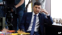Ukrainian comedian Volodymyr Zelenskiy, who played the nation's president in a popular TV series, and is running for president in next month's election, is photographed on the set of a movie, in Kyev, Ukraine, Feb. 6, 2019. 
