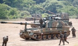 South Korean soldiers take part in a live fire exercise near the demilitarized zone separating the two Koreas in Paju, South Korea, June 23, 2020.