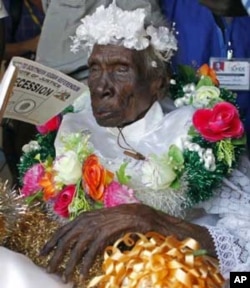 Rebecca Kadi Loburang Dinduch, believed to be the oldest south Sudanese, leaves a polling station after casting her vote in Juba January 12, 2011.