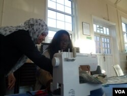 Suhad el Marsomi, an Iraqi refugee, teaches sewing while she awaits a decision on her asylum application, October 12, 2016. “Even if (it is for) free, it’s not a problem for me," she said. "Just I want to feel I’m human. I’m still human. I’m still in the life.”