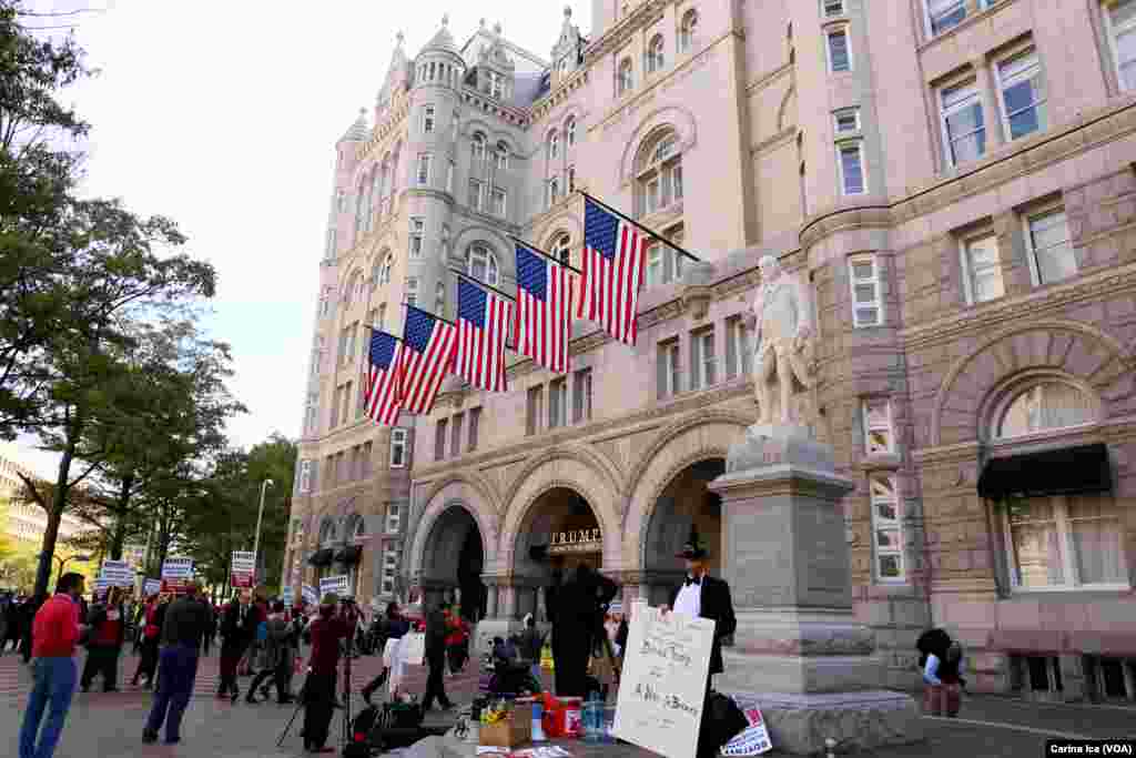 Hundreds protested Donald Trump at the opening of the International Trump Hotel at the Old U.S. Post Office Building in Washington, D.C. Trump was in town for the ribbon-cutting for the luxury hotel, less than two weeks before election day. October 26, 20