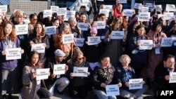 Environmental activists demonstrate in front of the convention center hosting international negotiations on reducing plastic pollution, in Busan, South Korea, on Nov. 29, 2024.