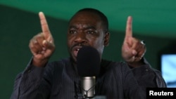 Ahmad Isah, the host of Nigeria's "Brekete Family" radio program, speaks to his audience at Human Rights Radio in Abuja, Nigeria, June 26, 2018.