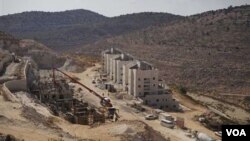 Pembangunan permukiman di Tepi Barat yang telah menjadi salah satu sumber persengketaan antara Israel dan Palestina.